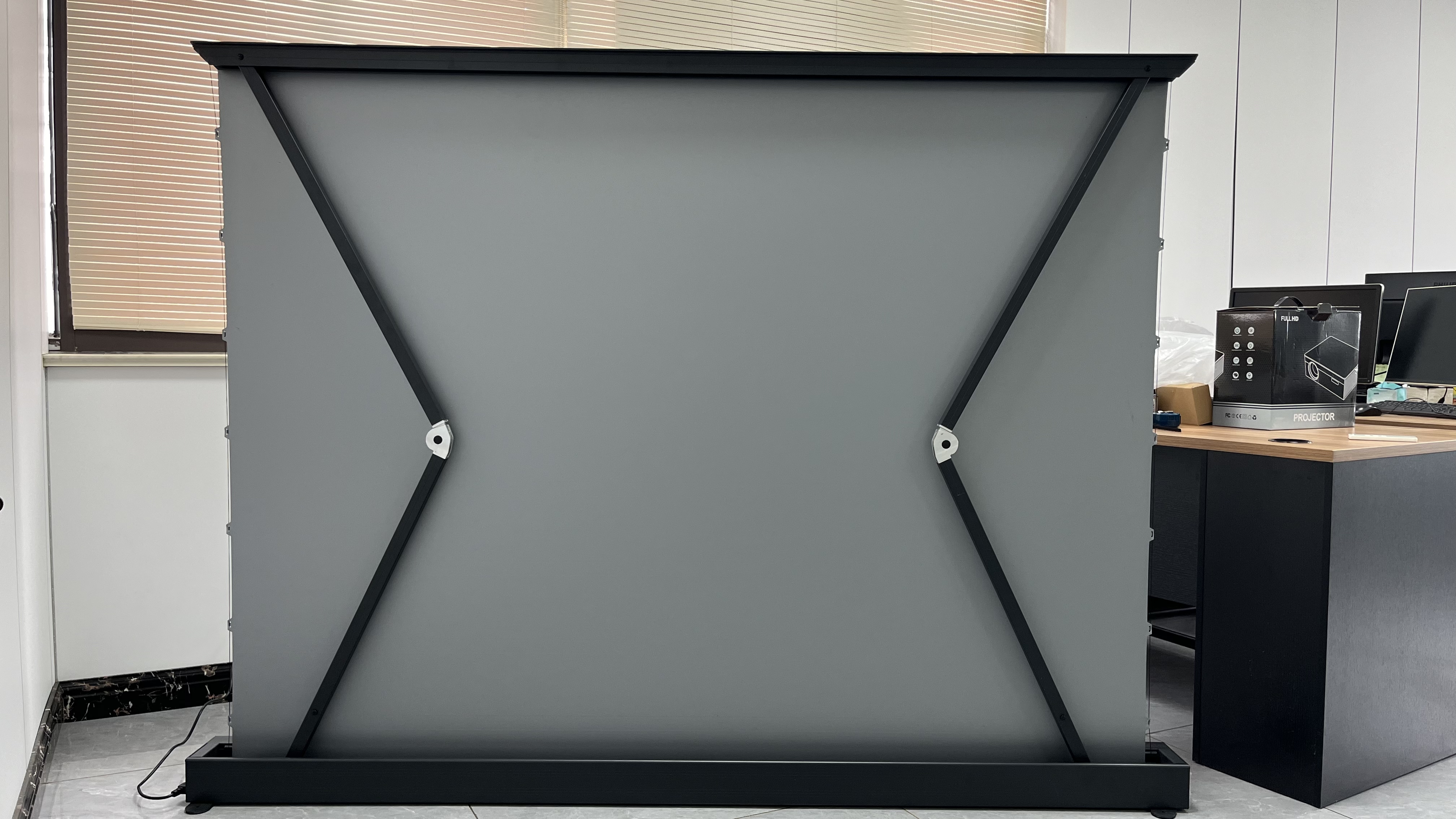 Motorized floor screen with ultra HD projection surface home theater office presentation