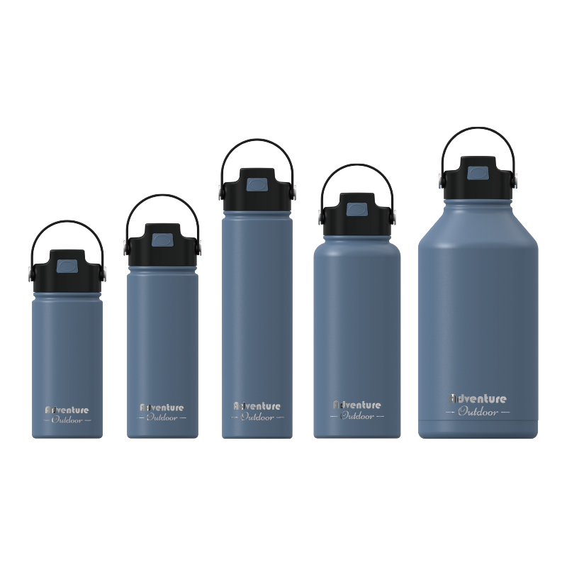Double‑wall vacuum insulated tumbler, push‑button pop‑up lid with sip nozzle and carry handle